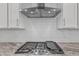 Stainless steel cooktop with modern design at 900 Sw Maynard Rd, Cary, NC 27511