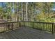 Spacious wooden deck overlooking a wooded area at 900 Sw Maynard Rd, Cary, NC 27511