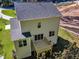Rear view of a two story house with deck at 900 Sw Maynard Rd, Cary, NC 27511
