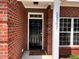 Brick home with a welcoming front porch at 3701 Greystone Dr, Rocky Mount, NC 27804