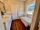 Spa-like bathroom with a soaking tub and double vanity at 3701 Greystone Dr, Rocky Mount, NC 27804