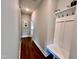 Bright hallway with wood flooring and built-in bench at 3701 Greystone Dr, Rocky Mount, NC 27804