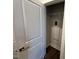 White utility closet with shelving and water heater at 11549 Helmond Way # 102, Raleigh, NC 27617