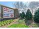 Shopping center entrance with various stores at 11549 Helmond Way # 102, Raleigh, NC 27617
