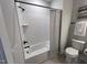 Clean bathroom with a tub and shower combination at 11549 Helmond Way # 102, Raleigh, NC 27617