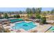 Resort-style pool area with lap lanes and a water slide at 11549 Helmond Way # 102, Raleigh, NC 27617