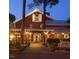 Rustic restaurant building at night at 11549 Helmond Way # 102, Raleigh, NC 27617