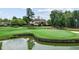 Stunning golf course view with water feature and clubhouse at 11549 Helmond Way # 102, Raleigh, NC 27617