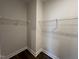 Walk-in closet with wire shelving, offering efficient storage solutions at 11549 Helmond Way # 102, Raleigh, NC 27617