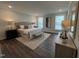 Spacious primary bedroom with plush bedding and large windows at 11549 Helmond Way # 102, Raleigh, NC 27617