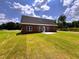 Brick home with spacious backyard and patio at 3701 Greystone Dr, Rocky Mount, NC 27804