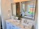 Elegant bathroom with double sinks and marble vanity at 3701 Greystone Dr, Rocky Mount, NC 27804