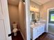 Double vanity bathroom with toilet and walk in shower at 3701 Greystone Dr, Rocky Mount, NC 27804