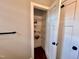 Linen closet with wire shelving and white door at 3701 Greystone Dr, Rocky Mount, NC 27804