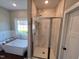 Modern bathroom with soaking tub and walk-in shower at 3701 Greystone Dr, Rocky Mount, NC 27804