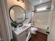 Updated bathroom with a tub, toilet and vanity at 3701 Greystone Dr, Rocky Mount, NC 27804