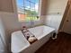 Luxurious bathroom with soaking tub and walk-in shower at 3701 Greystone Dr, Rocky Mount, NC 27804