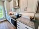 Modern kitchen with granite countertops and stainless steel appliances at 3701 Greystone Dr, Rocky Mount, NC 27804
