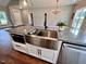 Kitchen island with farmhouse sink and granite countertop at 3701 Greystone Dr, Rocky Mount, NC 27804