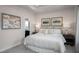 Main bedroom with king-size bed and ensuite bathroom at 1218 Helms St, Durham, NC 27713