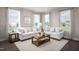 Bright living room with two sofas and a coffee table at 1218 Helms St, Durham, NC 27713