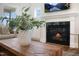 Modern gas fireplace with a sleek design and a beautiful mantel at 98 Claude Creek Dr, Smithfield, NC 27577