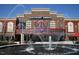 Southpoint Cinemas building with a large fountain in front at 2009 Opulent Oaks Ln # 23, Durham, NC 27713