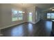 Spacious dining area with hardwood floors and access to a patio at 202 Rolling Pasture Way, Sanford, NC 27332