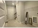 Unfinished laundry room with built-in shelving and storage at 202 Rolling Pasture Way, Sanford, NC 27332