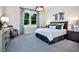 Comfortable bedroom with window and modern decor at 2865 Silk Hope Gum Springs Rd, Pittsboro, NC 27312