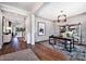Spacious home office with hardwood floors and large windows at 2865 Silk Hope Gum Springs Rd, Pittsboro, NC 27312