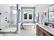 Spa-like bathroom with soaking tub and walk-in shower at 2865 Silk Hope Gum Springs Rd, Pittsboro, NC 27312