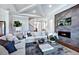 Living room with fireplace and built-in media shelving at 2865 Silk Hope Gum Springs Rd, Pittsboro, NC 27312