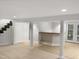 Finished basement with wet bar and access to patio at 4808 Connell Dr, Raleigh, NC 27612