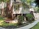 House exterior with brick and siding and a deck at 4808 Connell Dr, Raleigh, NC 27612