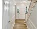 Inviting entryway with hardwood floors and staircase leading upstairs at 4808 Connell Dr, Raleigh, NC 27612