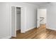 Bedroom with closet and hardwood floors at 4808 Connell Dr, Raleigh, NC 27612