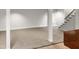 Spacious finished basement with neutral carpeting and ample storage at 4808 Connell Dr, Raleigh, NC 27612