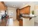 Spacious kitchen featuring wooden cabinets, dark countertops, and ample counter space at 114 Wembley Dr, Clayton, NC 27527