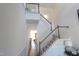 Elegant staircase with wooden railings leading to the second floor at 1055 Talisker Way # 19, Burlington, NC 27215