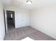 Simple bedroom with double doors and carpet at 1055 Talisker Way # 19, Burlington, NC 27215