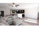 Open living room with a sectional sofa and views into the kitchen at 1055 Talisker Way # 19, Burlington, NC 27215