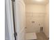 Laundry room with washer/dryer hookups and shelving at 1055 Talisker Way # 19, Burlington, NC 27215