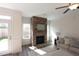 Living room fireplace with a stone surround and mantel at 1055 Talisker Way # 19, Burlington, NC 27215