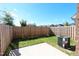 Private backyard with a wooden fence and concrete patio at 1055 Talisker Way # 19, Burlington, NC 27215