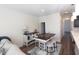 Charming breakfast nook with a rustic table and chairs at 1055 Talisker Way # 19, Burlington, NC 27215