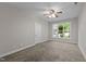 Bright and spacious bedroom with neutral walls and carpet flooring at 815 Brewer Ave, Wake Forest, NC 27587