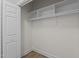 White closet with shelving and hanging rod at 815 Brewer Ave, Wake Forest, NC 27587