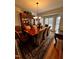 Formal dining room with a large table, chandelier, and hardwood floors at , Durham, NC 27713