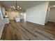 Bright dining room with hardwood floors and chandelier at 146 Swain St, Clayton, NC 27527